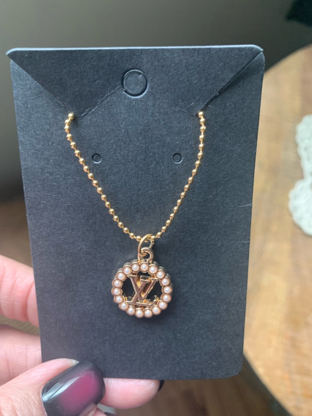 Elegant Gold-Tone Pearl-Trimmed Circle Pendant Necklace - Picture 3 of 3